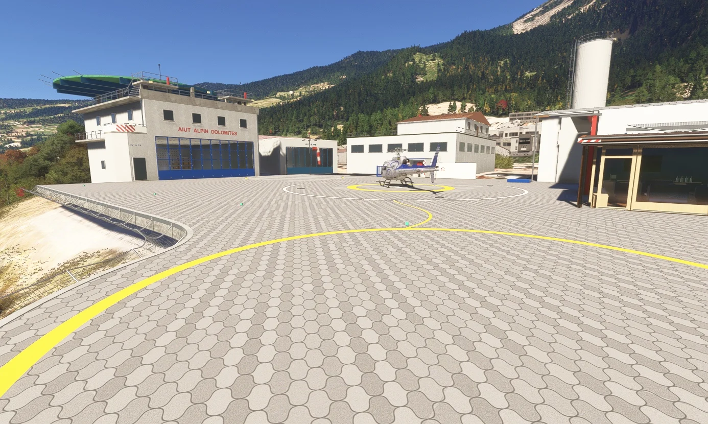 Helicopter parking circles and apron in front of the Aiut Alpin hangar.