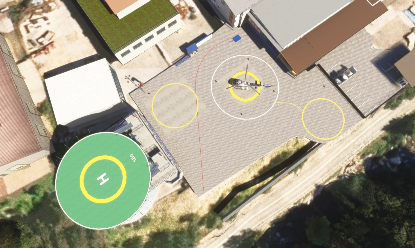 Overhead view of the rooftop helipad, apron and helicopter parking areas.